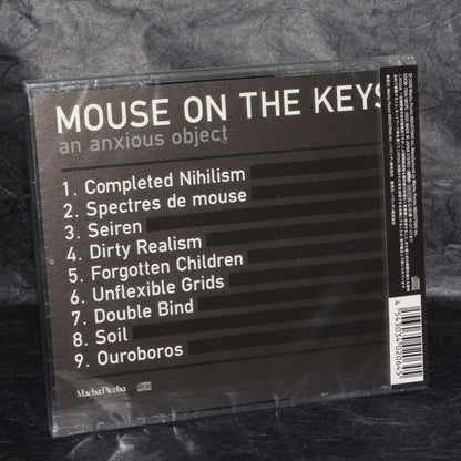 mouse on the keys - an anxious object