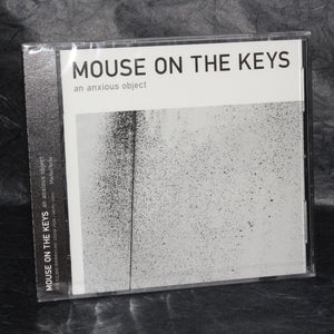 mouse on the keys - an anxious object