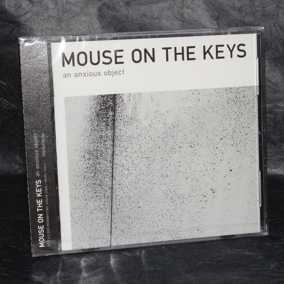 mouse on the keys - an anxious object